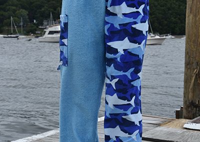 shark towel pants girl on dock