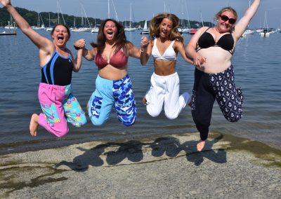 towel pants, 4 girls jumping in the air